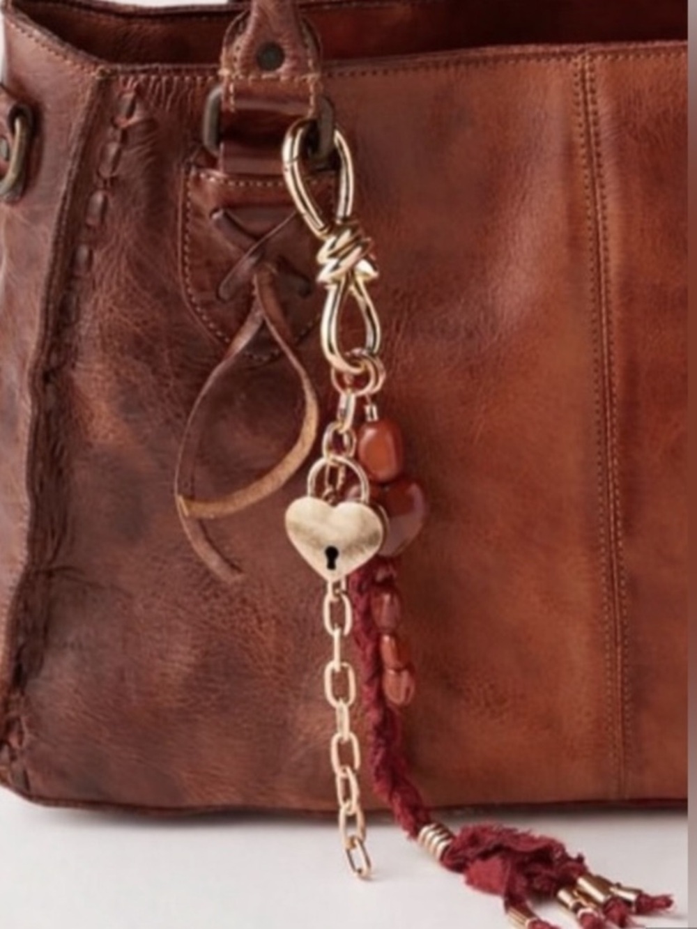 Free People semi precious charmed strand bag charm in Red